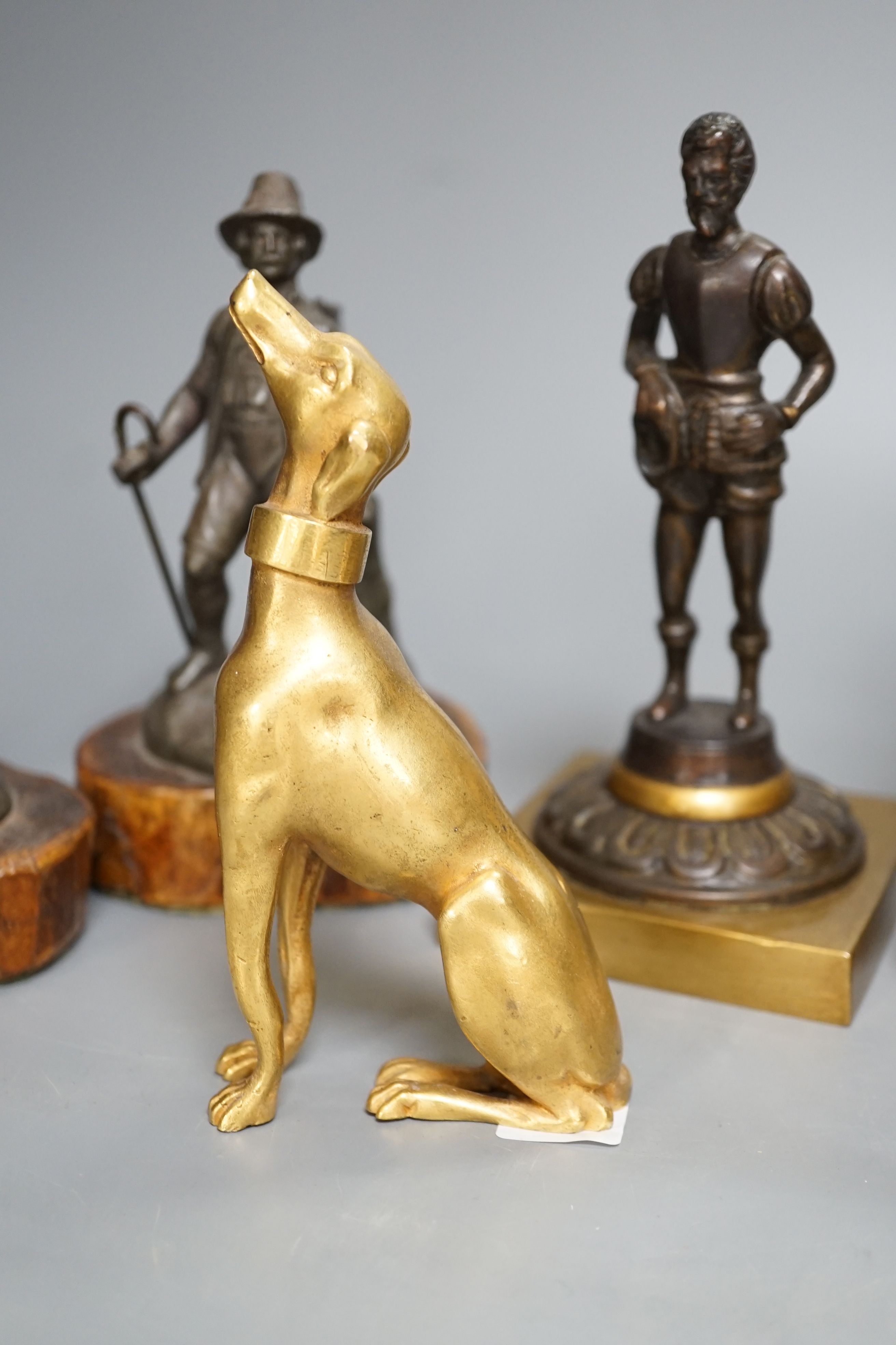 A brass Marly horse group , three decorative metal figures and a gilt bronze figure of a whippet (5)